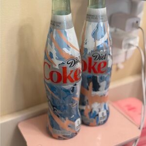 2-vintage Coca-Cola Bottles colorful